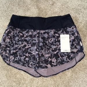 BRAND NEW ATHLETA CAMO SHORTS.